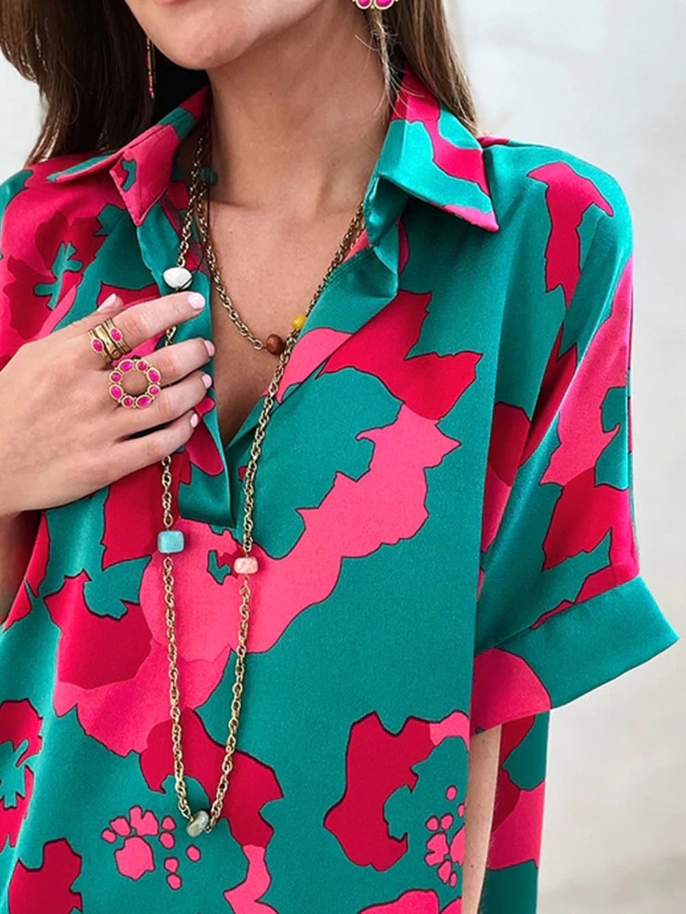 Abstract Green V-Neck Blouse with Geometric Print