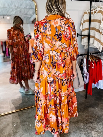 Abstract Orange Print Tiered Maxi Dress with Buttoned Half Sleeves